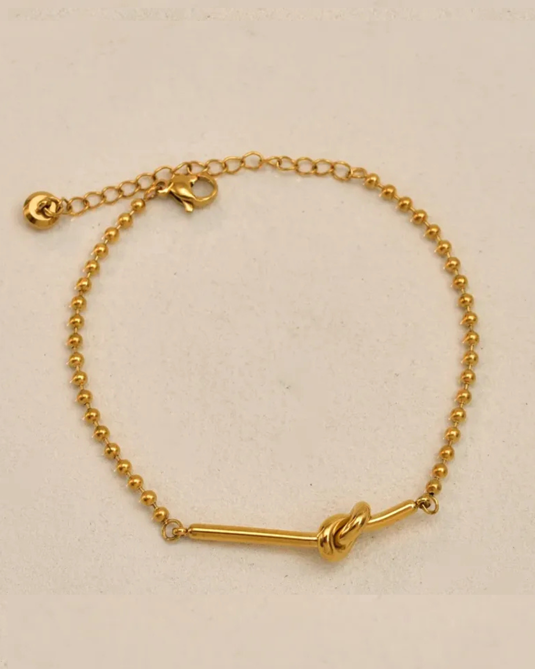 PULSERA NUDO GOLD